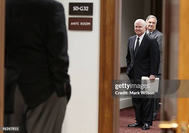 Defense Secretary Robert Gates prepares to walk into a Senate Armed Services Committee hearing on Capitol Hill on February 2, 2010 in Washington, DC....