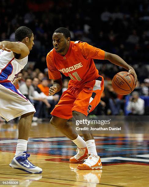 Scoop Jardine of the Syracuse Orange moves against Jeremiah Kelly of the DePaul Blue Demons at the Allstate Arena on January 30, 2010 in Rosemont,...