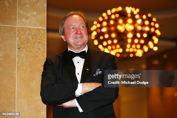 Legendary Essendon Bombers coach and Richmond Tigers footballer Kevin Sheedy poses during the Australian Football Hall of Fame at Crown Palladium on...