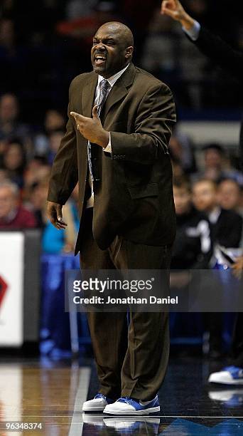 Interim head coach Tracy Webster of the DePaul Blue Demons gives instructions to his team during a game against the Syracuse Orange at the Allstate...