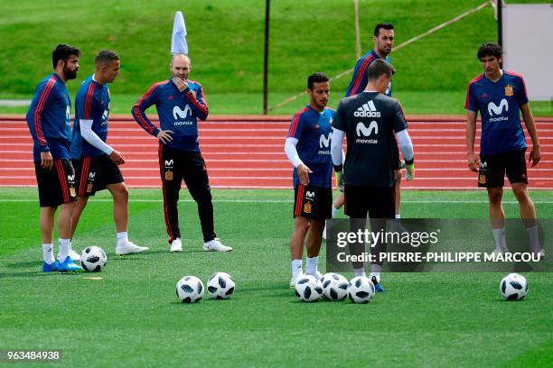 Spain's forward Diego Costa, Spain's forward Rodrigo, Spain's midfielder Andres Iniesta, Spain's midfielder Thiago, Spain's midfielder Sergio...