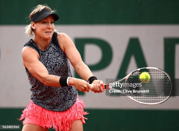 Bethanie Mattek-Sands of The United States plays a backhand during the ladies singles first round match against Johanna Larsson of Sweden during day...