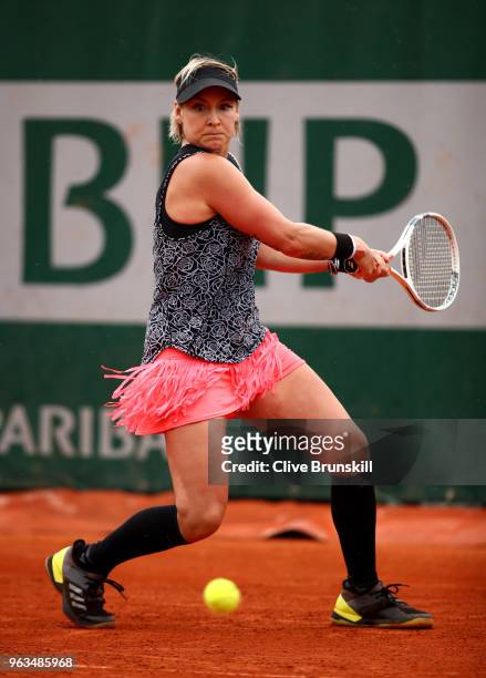 Bethanie Mattek-Sands of The United States plays a backhand during the ladies singles first round match against Johanna Larsson of Sweden during day...