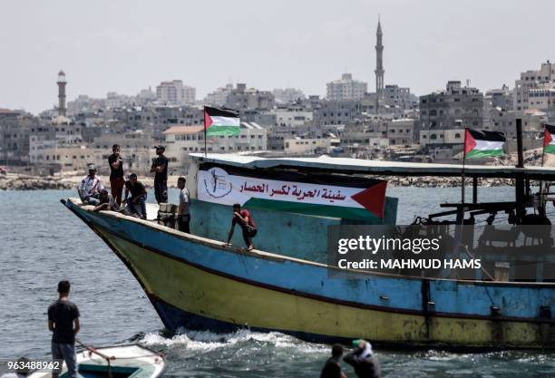 Picture taken on May 29, 2018 shows fishing boats carrying a group of Palestinian activists who are protesting and perhaps trying to breach Israel's...