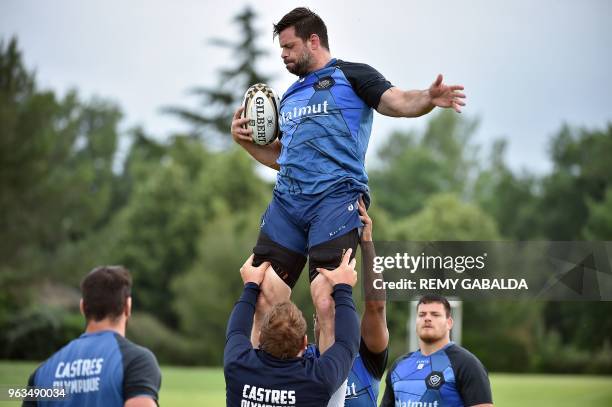 Castres' captain Rodrigo Capo Ortega grabs the ball in a line out during a training at Levezou stadium in Saix, near Castres, southern France, on May...