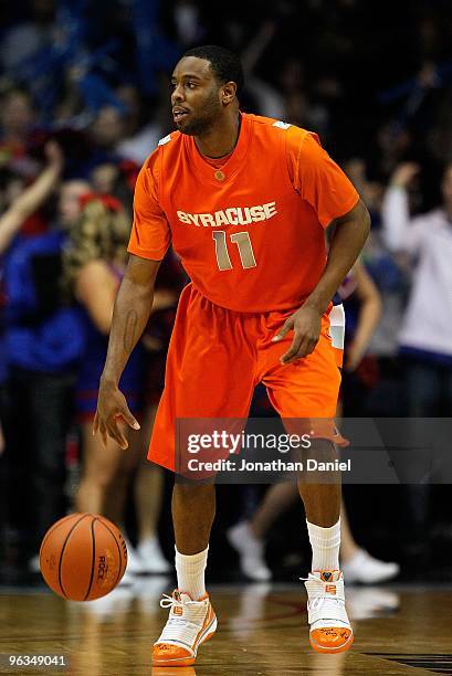 Scoop Jardine of the Syracuse Orange brings the ball up court against the DePaul Blue Demons at the Allstate Arena on January 30, 2010 in Rosemont,...