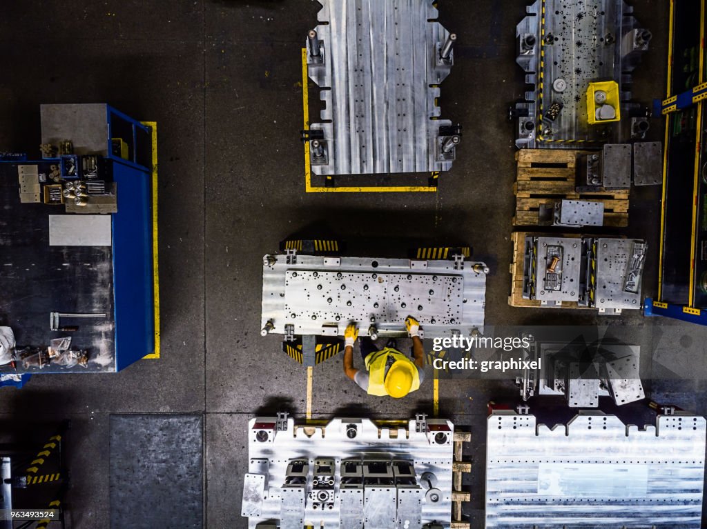 Industrial Worker in a Production Line