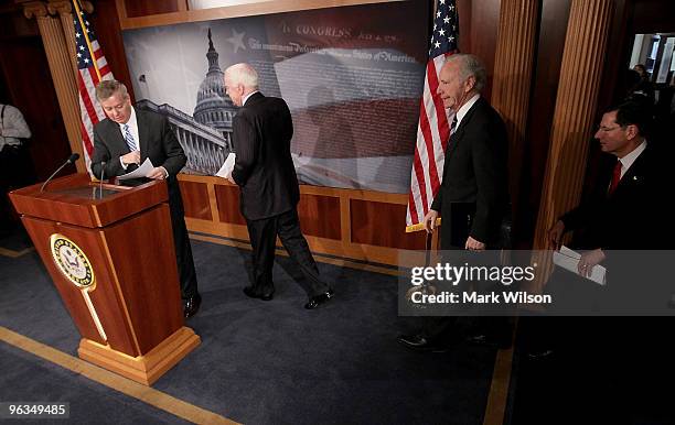 Sen. Lindsey Graham and Sen. John McCain and Sen. Joeseph Lieberman and others arrive at a news conference on Capitol Hill on February 2, 2010 in...