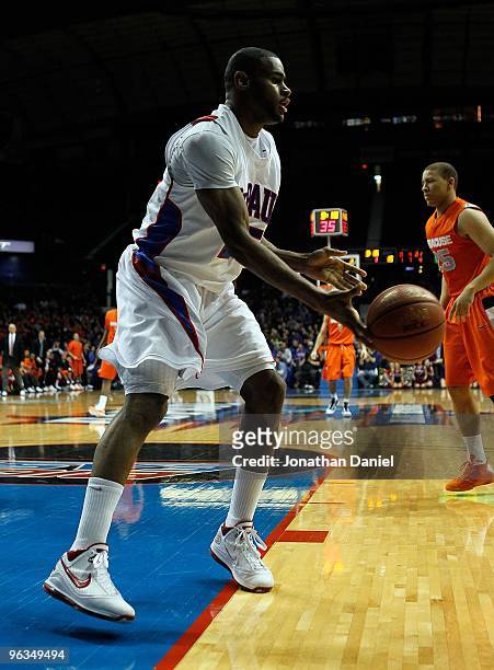Eric Wallace of the DePaul Blue Demons passes the ball after a rebound against the Syracuse Orange at the Allstate Arena on January 30, 2010 in...
