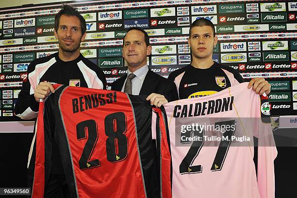 Francesco Benussi and Marco Calderoni , new Palermo signings show their new shirt as vice-president Guglielmo Micciche looks on during a press...