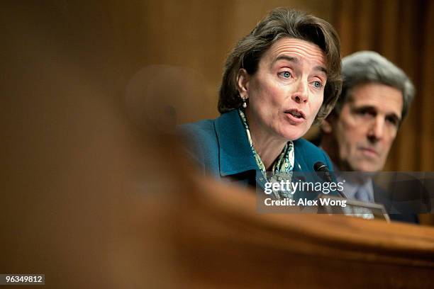 Sen. Blanche Lincoln speaks as Sen. John Kerry looks on during a hearing before the Senate Finance Committee on Capitol Hill February 2, 2010 in...