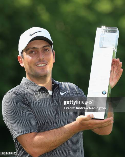 Francesco Molinari of Italy poses with the trophy after winning the BMW PGA Championship at Wentworth on May 27, 2018 in Virginia Water, England.