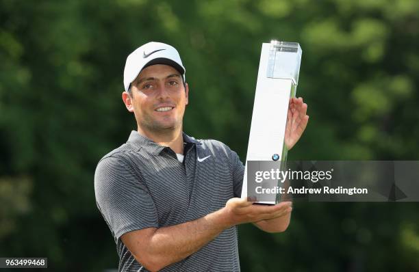 Francesco Molinari of Italy poses with the trophy after winning the BMW PGA Championship at Wentworth on May 27, 2018 in Virginia Water, England.