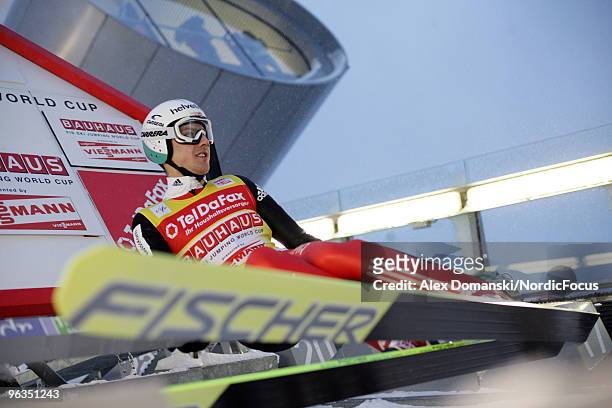 Simon Ammann of Switzerland competes during the qualification round of the FIS Ski Jumping World Cup on February 2, 2010 in Klingenthal, Germany.