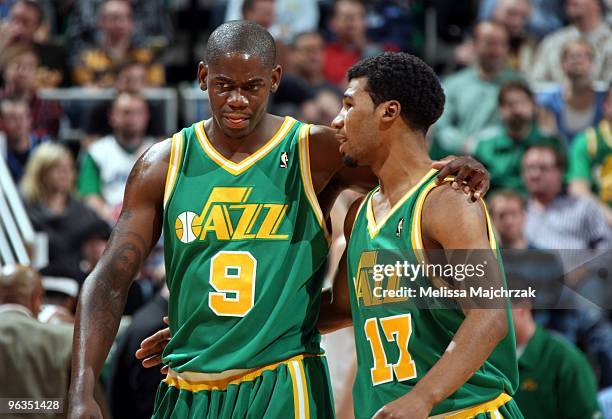 Ronnie Brewer and Ronnie Price of the Utah Jazz talks on the court during the game against the Cleveland Cavaliers at the EnergySolutions Arena on...