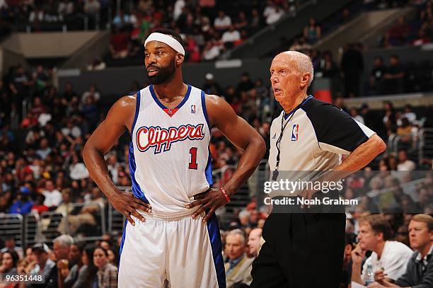 Baron Davis of the Los Angeles Clippers stands with referee Dick Bavetta during the game against the Miami Heat on January 10, 2010 at Staples Center...