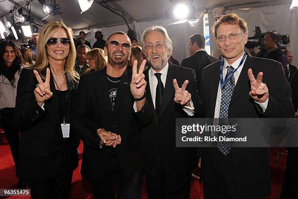 Barbara Bach, musician Ringo Starr, NARAS President Neil Portnow and guest arrive at the 52nd Annual GRAMMY Awards held at Staples Center on January...