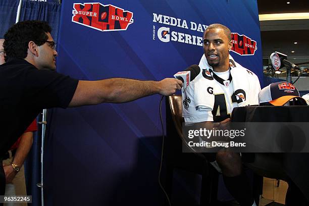 Darren Sharper of the New Orleans Saints speaks to members of the media during Super Bowl XLIV Media Day at Sun Life Stadium on February 2, 2010 in...