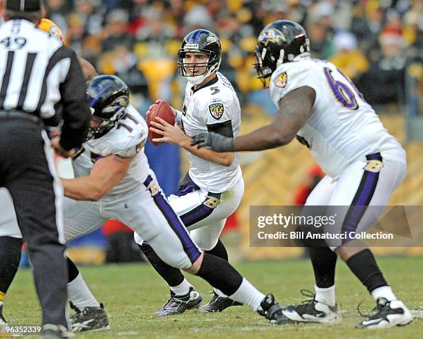 Quarterback Joe Flacco of the Baltimore Ravens drops back to pass during a game on December 27, 2009 against the Baltimore Ravens at Heinz Field in...