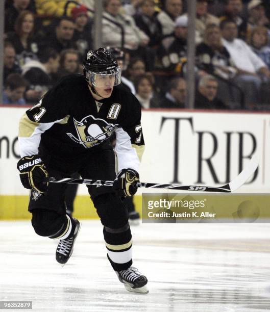 Evgeni Malkin of the Pittsburgh Penguins skates against the Detroit Red Wings at Mellon Arena on January 31, 2010 in Pittsburgh, Pennsylvania. The...