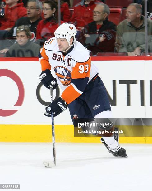 Doug Weight of the New York Islanders skates with the puck during a NHL game against the Carolina Hurricanes on January 28, 2010 at RBC Center in...