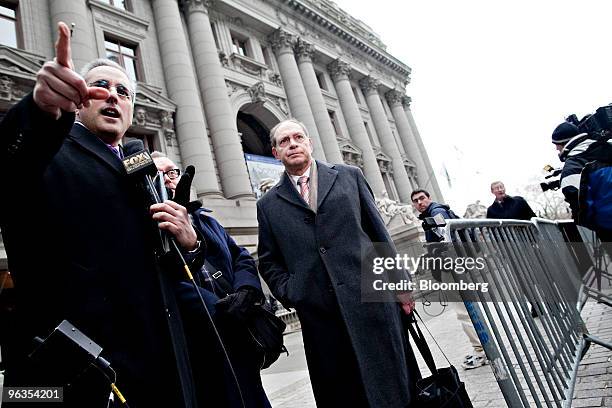 Irving Picard, partner at Baker & Hostetler LLP, center, pauses during an interview outside U.S. Bankruptcy Court in New York, U.S., on Tuesday, Feb....