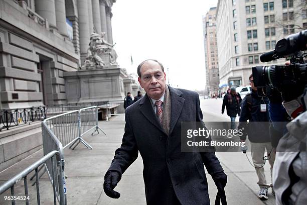 Irving Picard, partner at Baker & Hostetler LLP, leaves U.S. Bankruptcy Court in New York, U.S., on Tuesday, Feb. 2, 2010. The judge overseeing the...