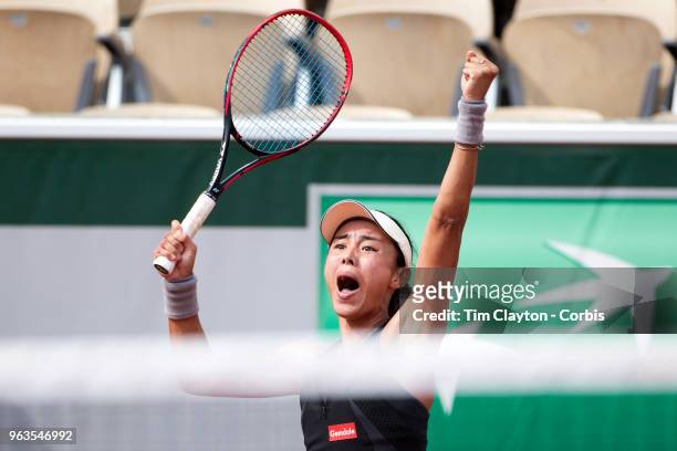 French Open Tennis Tournament - Day One. Wang Qiang of China celebrates her victory over Venus Williams of the United States on Court Suzanne-Lenglen...