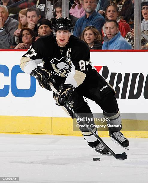 Sidney Crosby of the Pittsburgh Penguins moves the puck up ice against the Detroit Red Wings on January 31, 2010 at Mellon Arena in Pittsburgh,...