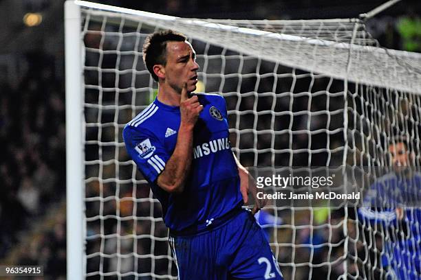 John Terry of Chelsea gestures following his team's first goal during the Barclays Premier League match between Hull City and Chelsea at the KC...