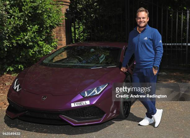 Tyrrell Hatton of Hatton is pictured with his car at Wentworth on May 23, 2018 in Virginia Water, England.
