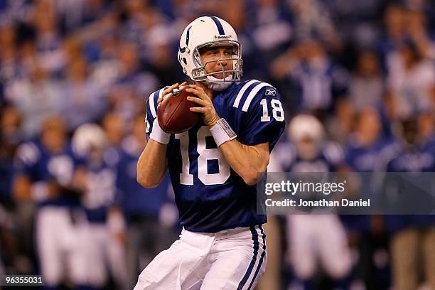 Quarterback Peyton Manning of the Indianapolis Colts looks to pass while playing against the New York Jets during the AFC Championship Game at Lucas...