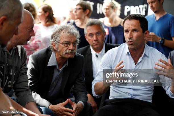 Benoit Hamon, leader of the left-wing political movement Generations , speaks during a meeting with seven employees on hunger strike at the Centre...