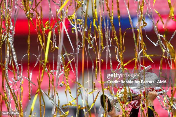 Richard Wood of Rotherham United lifts the EFL Sky Bet League One Play Off final trophy with his team mates during the Sky Bet League One Play Off...