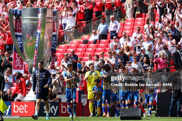 Players of Shrewsbury Town walk out on to the pitch at Wembley Stadium during the Sky Bet League One Play Off Final between Rotherham United and...