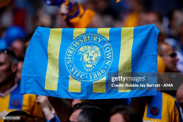 Fan of Shrewsbury Town holds up a flag during the Sky Bet League One Play Off Final between Rotherham United and Shrewsbury Town at Wembley Stadium...