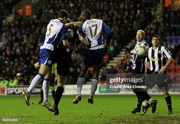 Stephen Hunt of Notts County scores the opening goal during the FA Cup sponsored by E.ON 4th Round Replay match between Wigan Athletic and Notts...