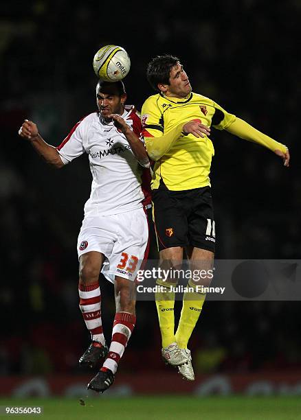 Danny Graham of Watford and Jonathan Fortune of Sheffield United compete for a header during the Coca-Cola Championship match between Watford and...