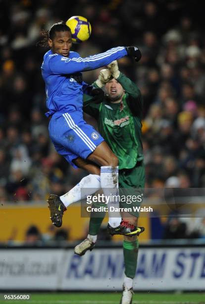 Didier Drogba of Chelsea competes for the ball with Boaz Myhill of Hull City during the Barclays Premier League match between Hull City and Chelsea...