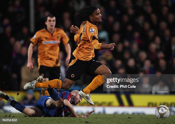 Michael Mancienne of Wolverhampton Wanderers evades Shaun Derry of Crystal Palace during the FA Cup sponsored by E.ON Final 4th round replay match...