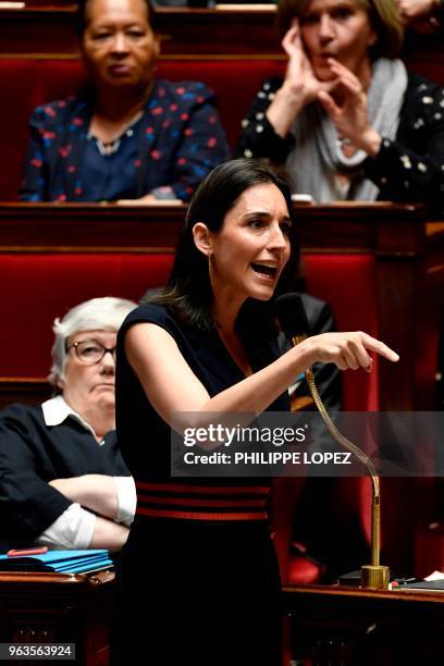 French Minister attached to the Minister of Ecological and Inclusive Transition Brune Poirson gestures as she speaks during a session of questions to...