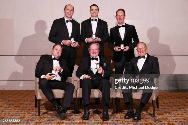 Inductees David Neitz, Matthew Scarlett, Terry Wallace, Wayne Johsnton, Kevin Sheedy and Mel Whinnen pose during the Australian Football Hall of Fame...