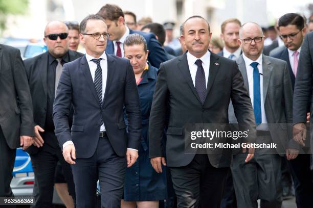 Heiko Maas, Foreign Minister of Germany and Mevlut Cavusoglu, Foreign Minister of Turkey, visit the memorial site of the arson attack on the house of...