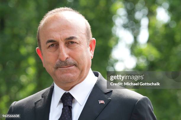 Mevlut Cavusoglu, Foreign Minister of Turkey, visits the memorial site of the arson attack on the house of the Turkish Genc family 25 years ago on...