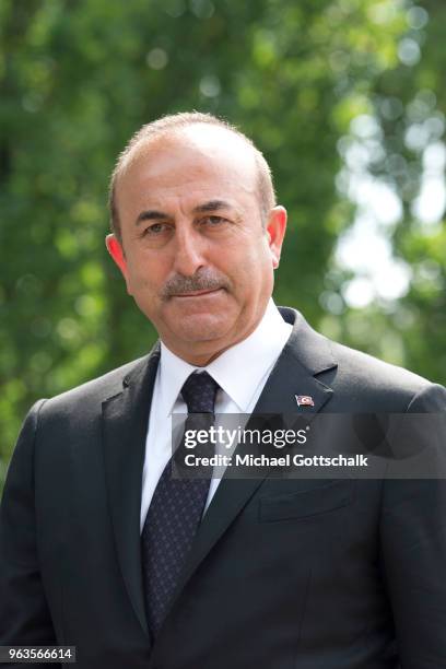 Mevlut Cavusoglu, Foreign Minister of Turkey, visits the memorial site of the arson attack on the house of the Turkish Genc family 25 years ago on...