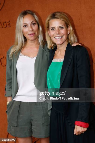 Team of "Telematin" Charlotte Bouteloup and Laura Tenoudji attend the 2018 French Open - Day Three at Roland Garros on May 29, 2018 in Paris, France.