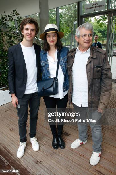 Actors Thomas Soliveres, his companion Lucie Boujenah and her uncle Michel Boujenah attend the 2018 French Open - Day Three at Roland Garros on May...