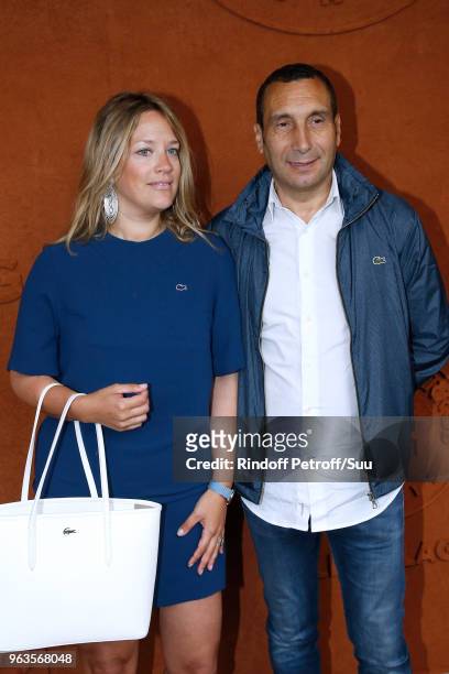 Zinedine Soualem and Caroline Fraindt attend the 2018 French Open - Day Three at Roland Garros on May 29, 2018 in Paris, France.