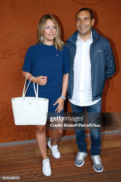 Zinedine Soualem and Caroline Fraindt attend the 2018 French Open - Day Three at Roland Garros on May 29, 2018 in Paris, France.