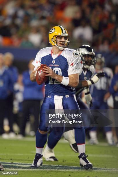 Quarterback Aaron Rodgers of the Green Bay Packers looks to pass the ball during the 2010 AFC-NFC Pro Bowl at Sun Life Stadium on January 31, 2010 in...